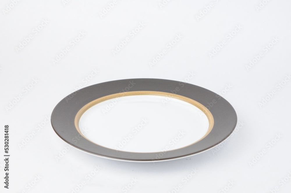 white plate with brown plate border isolated on white background white plate with brown plate border isolated on white background