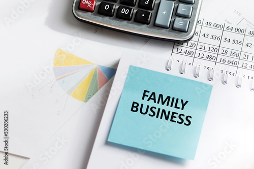 FAMILY BUSINESS text on sticker on chart background, business