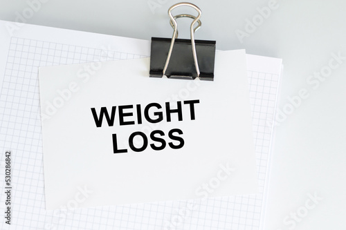 weight loss a card the table. Medical concept