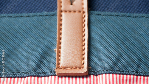 Wallpaper Mural Correa de cuero en tejido denim azul sobre estampado a rayas Torontodigital.ca