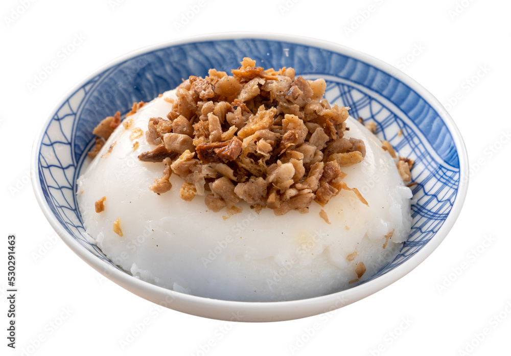Taiwanese savory rice pudding Wa gui with chopped dried radish and soy sauce isolated on white background. Taiwanese savory rice pudding Wa gui with chopped dried radish and soy sauce isolated on white background.