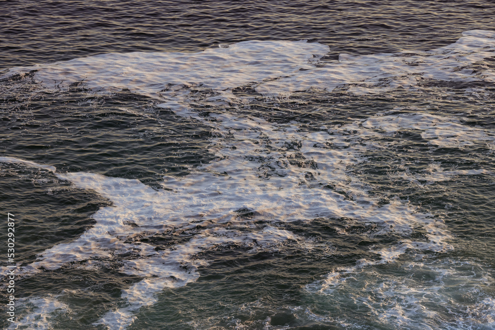 High angle view of dark blue sea with sea waves High angle view of dark blue sea with sea waves