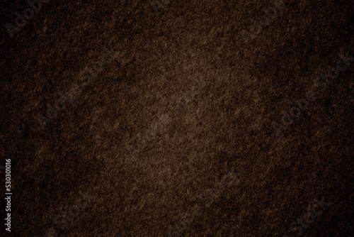 Dark brown seamless rough texture background