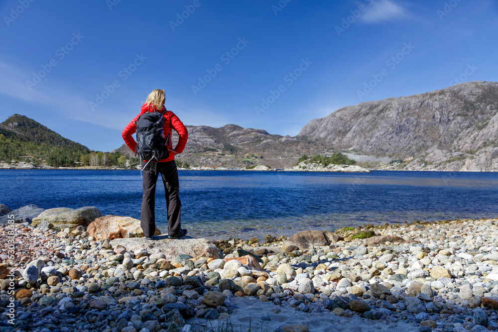 Norway crystal clear fjord viewed by single female