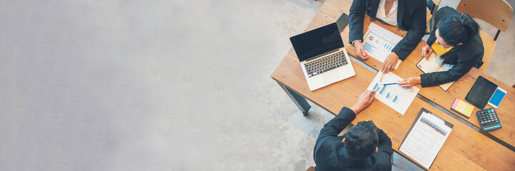 Banner top view business people meeting together at office desk in conference room. Panorama Team business meeting partnership plan brainstorm together. Team Collaborate partner group with copy space