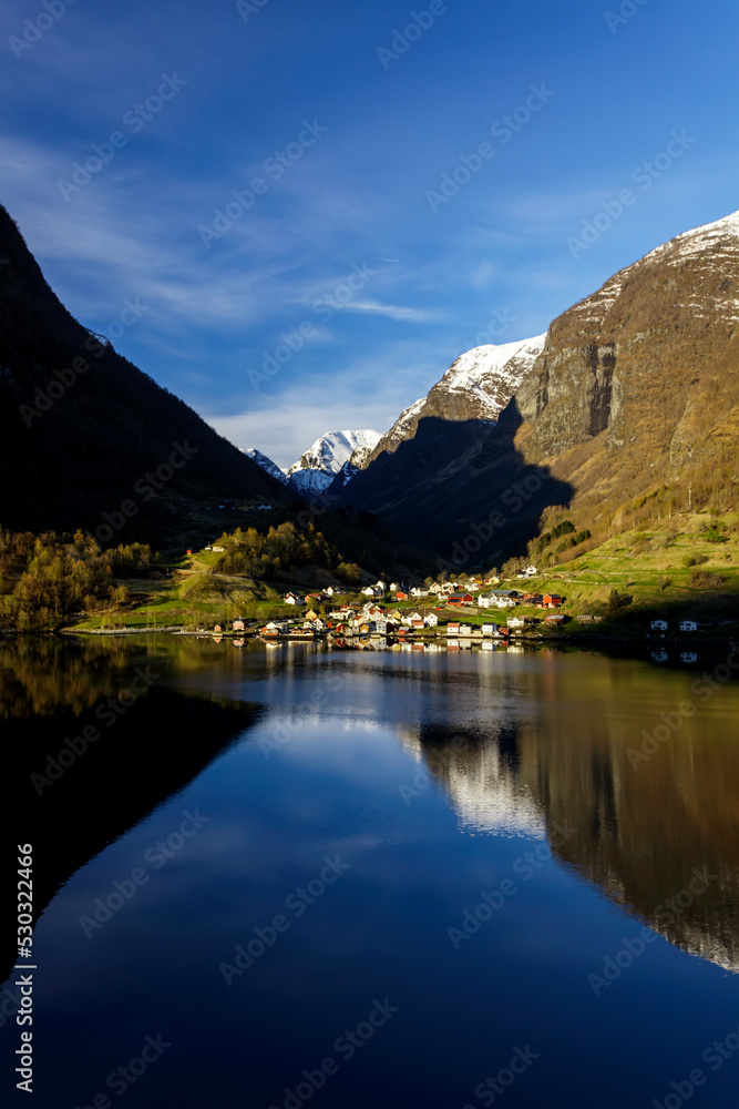 View of Norwegian small town in scenic valley