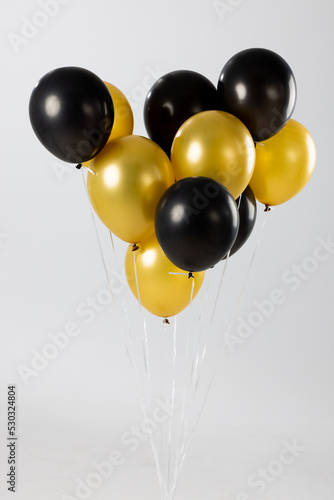 Composition of close up of new years balloons on white background