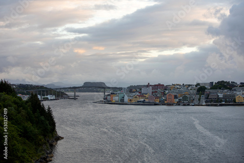 Kristiansund cityscape, coastal Norwegian town with colorful wooden houses © Tomsickova