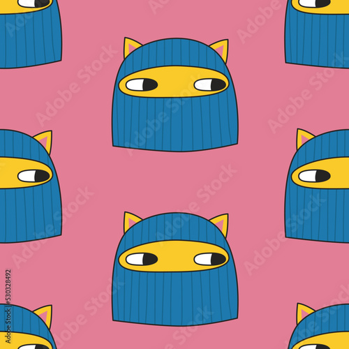 Seamless pattern with cute cat in balaclava. Vector illustration