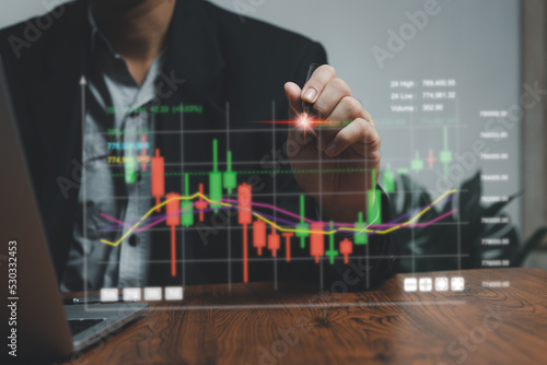 Businessmen stock market trading at computer laptop.Business finance analysis growth indicators of positive growth and marketing investment forex exchange planning concept
