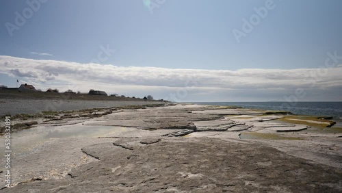 Limestone Formations at beach in Oland Island, Sweden, Sunny Fresh Spring Day photo