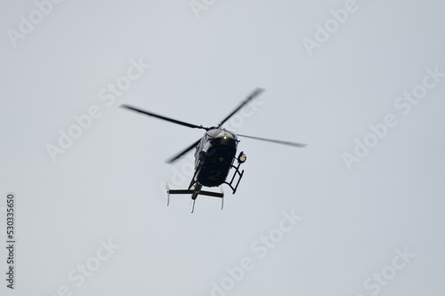 german police helicopter floating in the sky