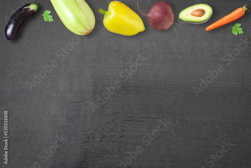 Background with vegetables - eggplant, zucchini, avocado, carrot and sweet pepper