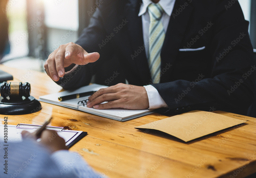 Lawyer, contract agreements document and legal proceedings. Lawyer, contract agreements document and legal proceedings.