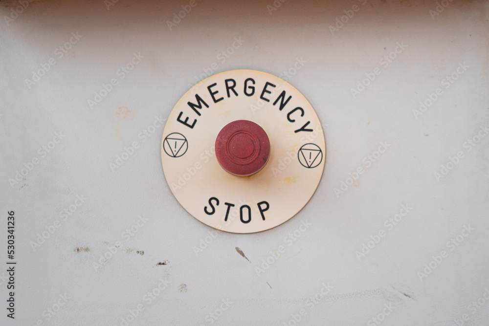 Emergency shutdown (ESD) switch on machinery system control panel, Pushing to stop the machine