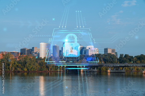 Panoramic view, Washington towards Arlington financial downtown, city skyline over Potomac River. Virginia, USA. The concept of cyber security to protect confidential information, padlock hologram