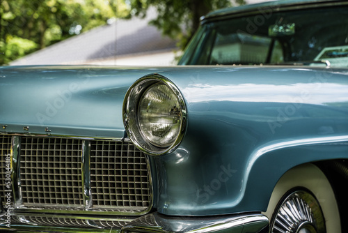 vintage car headlight closeup © cmeyhoff