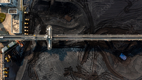 Εκτύπωση καμβά Aerial top view moving belt with heap of coal next to the coal power plant, Coal