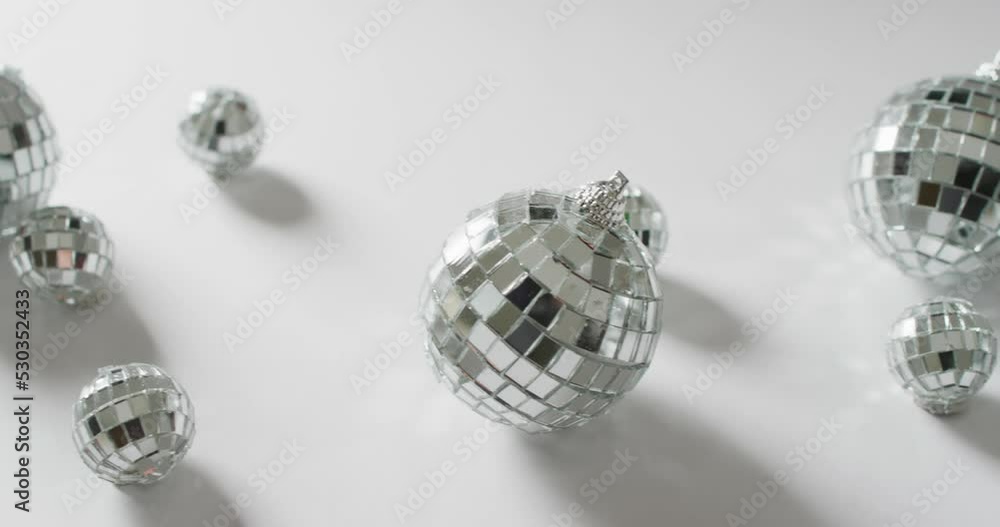 Video of mirror balls and shadows on white background Video of mirror balls and shadows on white background