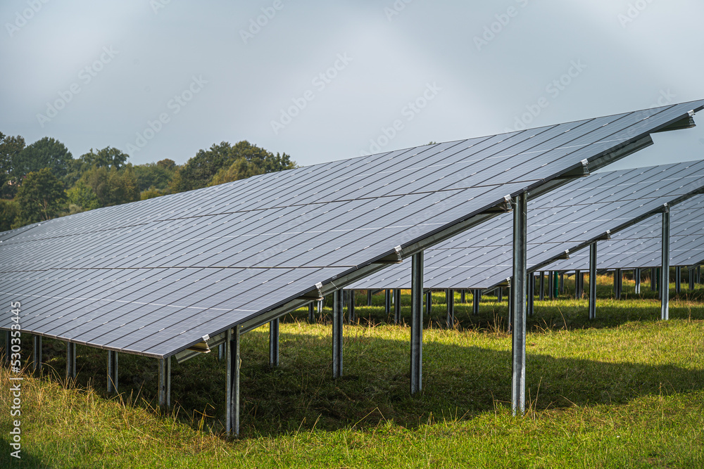 Generating clean energy with solar panels in a large park in Germany Bavaria. Renewable energy through solar panels to generate clean energy. Generating clean energy with solar panels in a large park in Germany Bavaria. Renewable energy through solar panels to generate clean energy.