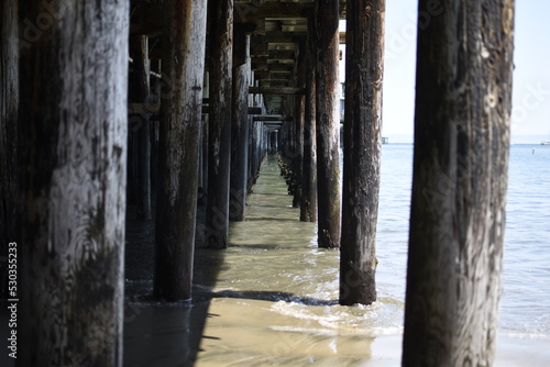 Underside view of a pier.