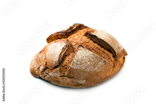 Tipico pane pugliese intero e isolato su fondo bianco, cibo italiano  photo