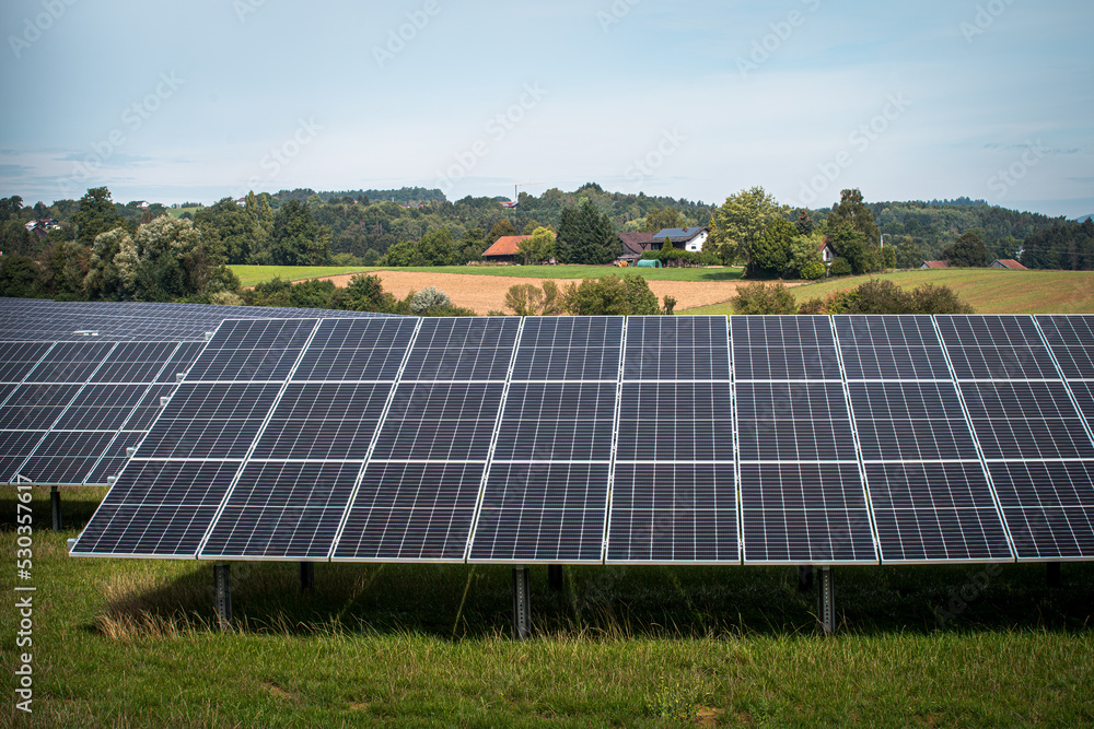 Solar panels in solar power plant in Germany Bavaria. Renewable energy through solar panels to generate clean energy. Green electricity. Solar panels in solar power plant in Germany Bavaria. Renewable energy through solar panels to generate clean energy. Green electricity.