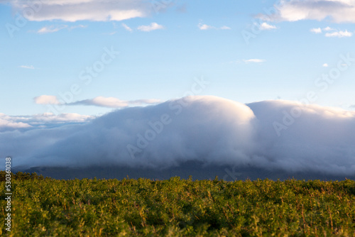 Iceland Mountain Landscape with Rolling Clouds at Sunrise