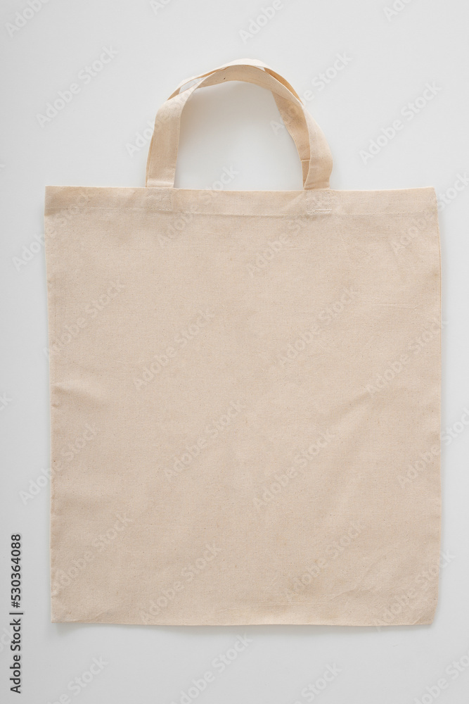 Blank Eco Friendly Beige Colour Fashion Canvas Tote Bag Isolated on White Background. Empty Reusable Bag for Groceries. Clear Shopping Bag. Design Template for Mock-up. Front View. Studio Photography. Blank Eco Friendly Beige Colour Fashion Canvas Tote Bag Isolated on White Background. Empty Reusable Bag for Groceries. Clear Shopping Bag. Design Template for Mock-up. Front View. Studio Photography.