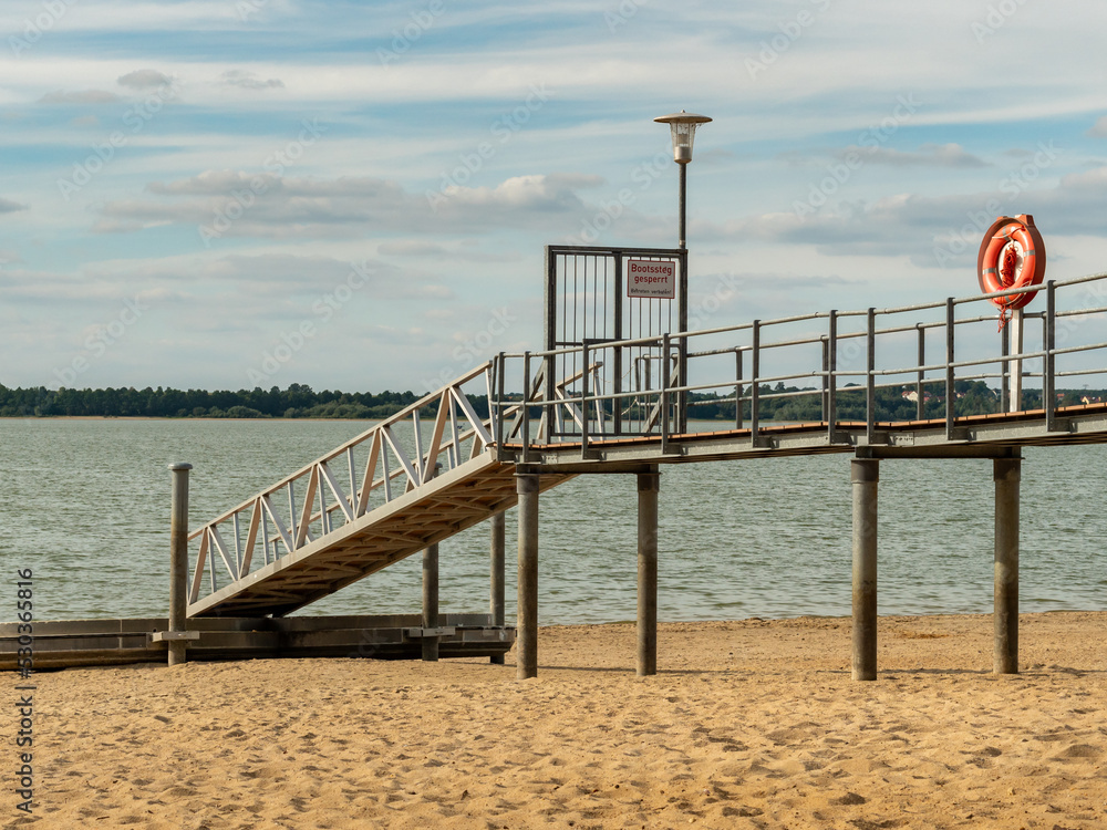 Landing stage for boats at the Bautzen Reservoir. There is not enough water in the reservoir to run the landing stage. The drought period in the summer season is the reason for the low water level.