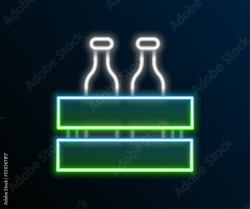 Fototapeta Naklejka Na Ścianę i Meble -  Glowing neon line Pack of beer bottles icon isolated on black background. Wooden box and beer bottles. Case crate beer box sign. Colorful outline concept. Vector