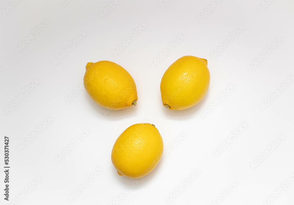 Lemons on a white background. View from above. Lemons on a white background. View from above.