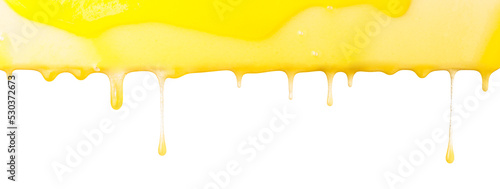 Dripping honey on white background, golden oil border.