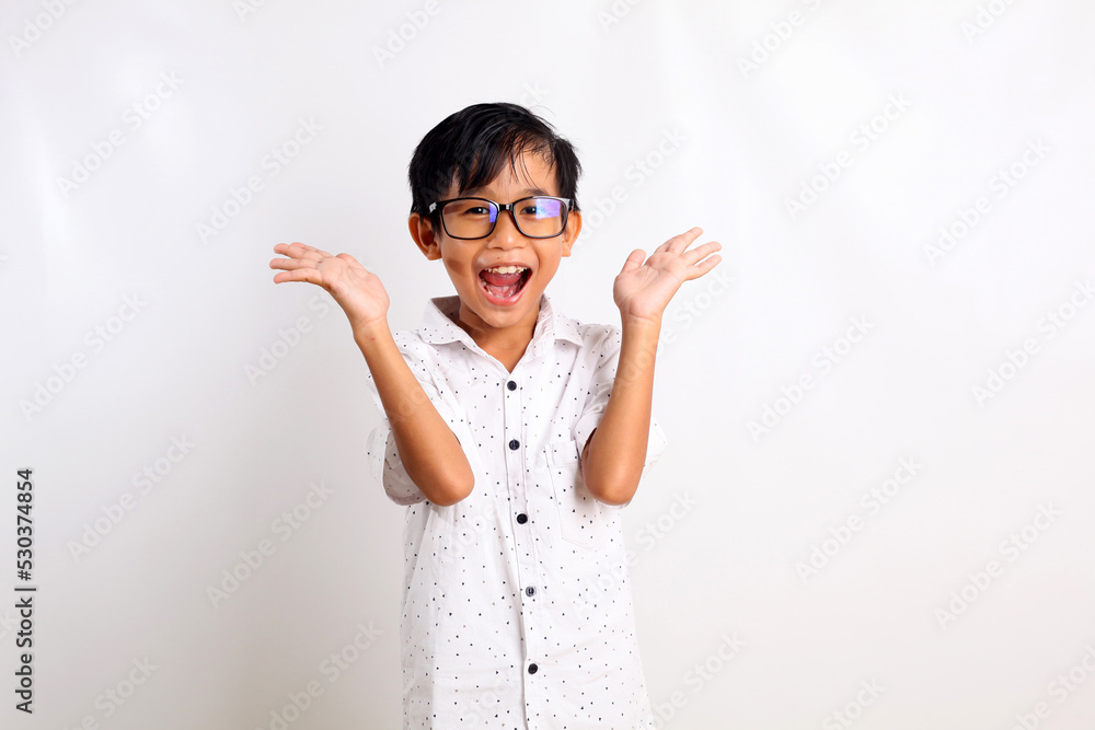 Surprised expression of asian student standing while shouting. Isolated on white background Surprised expression of asian student standing while shouting. Isolated on white background