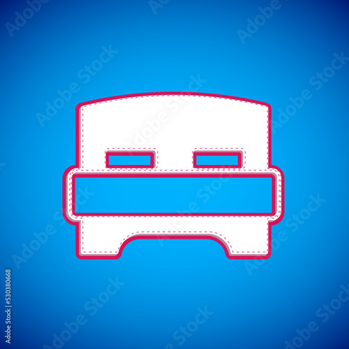 White Big bed for two or one person icon isolated on blue background. Vector