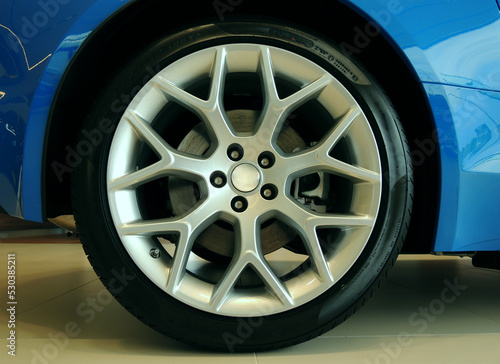 Ultralight alloy wheel mounted on a sports car closeup stock photo © AnyVIDStudio