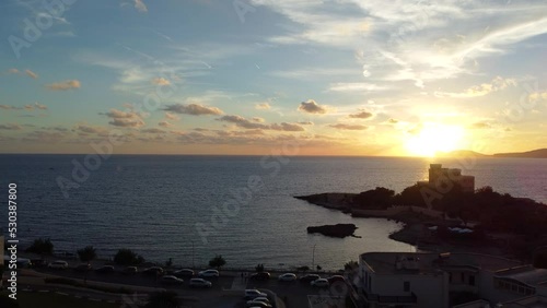 Drone view at sunset from las tronas with capocaccia in background in the Alghero coast in Sardinia, Italy
 photo