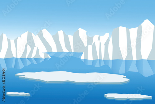Melting ice floe with ice berg in the background, caused by the global warming effect.