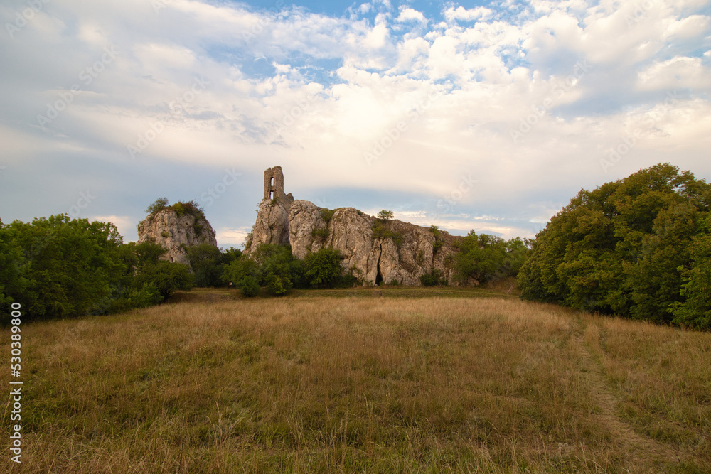 A ruin of castle Sirotci hradek in Moravia region, sunset light.	
