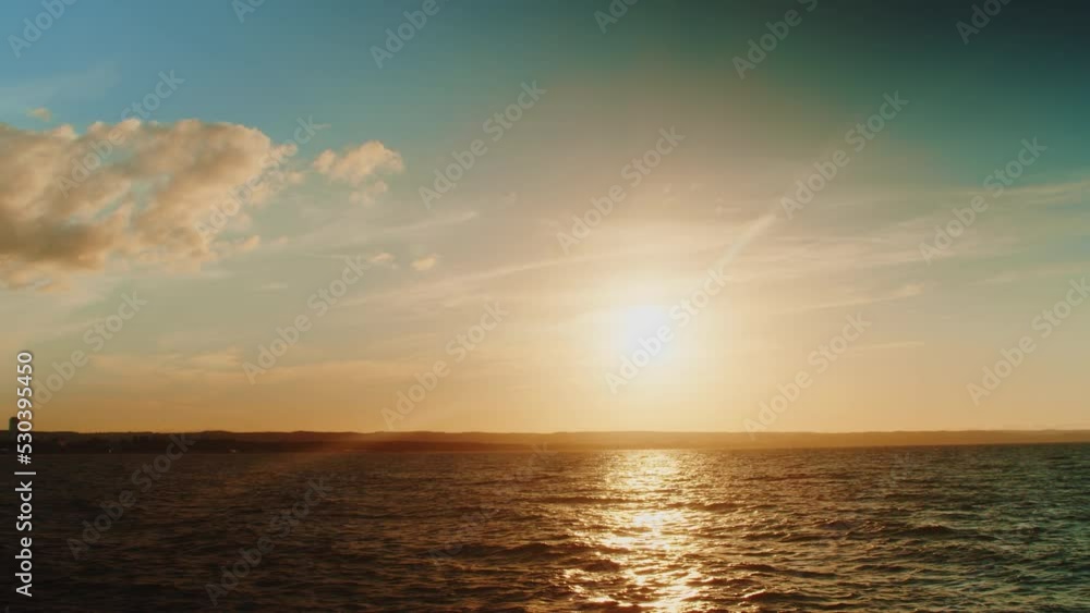 Time lapse Seascape with beautiful sunset and clouds in the sky. Time lapse beautiful sunset scenery. Amazing light of nature, cloudy sky clouds receding rolling, colorful dark sunset clouds over sea Time lapse Seascape with beautiful sunset and clouds in the sky. Time lapse beautiful sunset scenery. Amazing light of nature, cloudy sky clouds receding rolling, colorful dark sunset clouds over sea