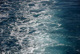 Sea view from stern of yacht. Trace on water from yacht's engine.  Sea foam. Copy space. Close-up. Selective focus.
