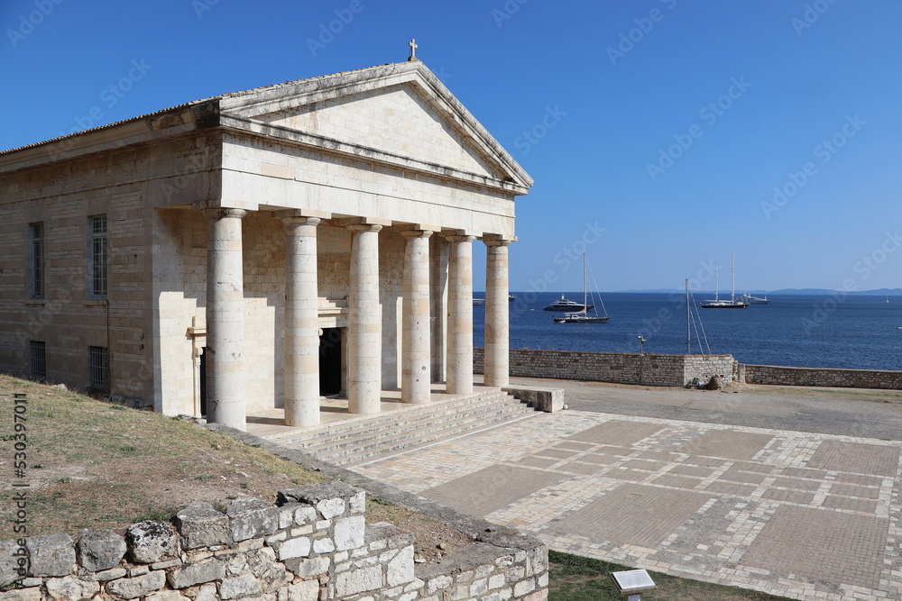 The old Venetian fortress of Corfu town and Holy Church of Saint George, Corfu, Greece. The Old Fortress of Corfu is a Venetian fortress in the city of Corfu. Venetian Old Fortress