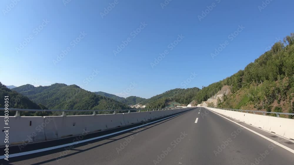 Driving on the new highway in Montenegro, beautiful view of many tunnels and bridges through the mountains, point of view, time lapse Driving on the new highway in Montenegro, beautiful view of many tunnels and bridges through the mountains, point of view, time lapse