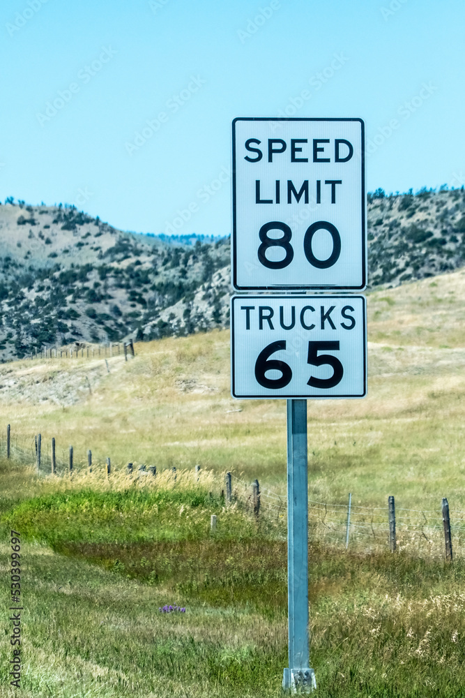 speed limit 85, 65 truck highway sign in montana speed limit 85, 65 truck highway sign in montana