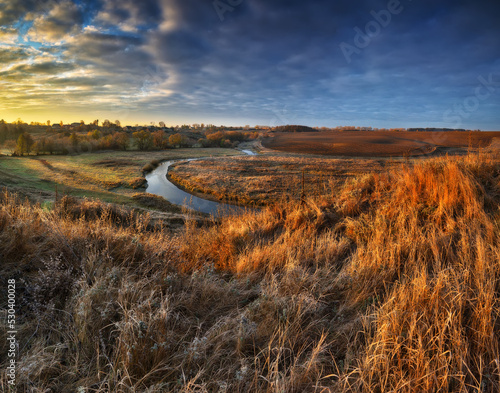 Autumn nature. Landscape of sunrise over river in autumn morning. Nature of Ukraine  