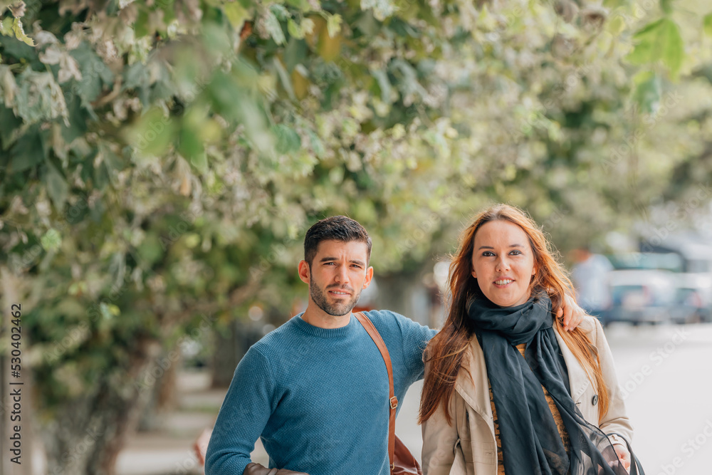 outdoor couple strolling in autumn outdoor couple strolling in autumn