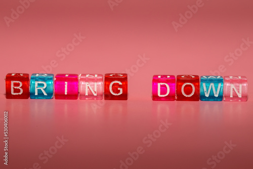 the word "bring down" made up of cubes