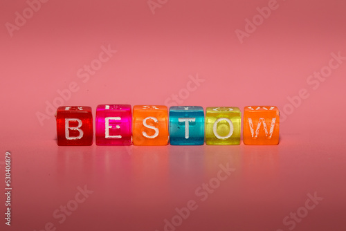 the word "bestow" made up of cubes