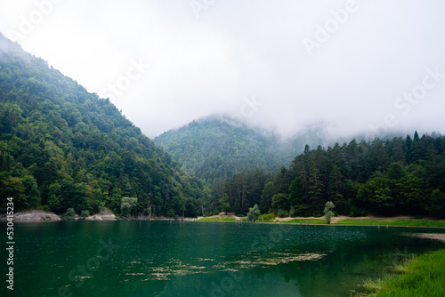 untouched lake formation in the forest , colorful forest landscapes , Suluklu lake , one of the national parks in Turkey photo