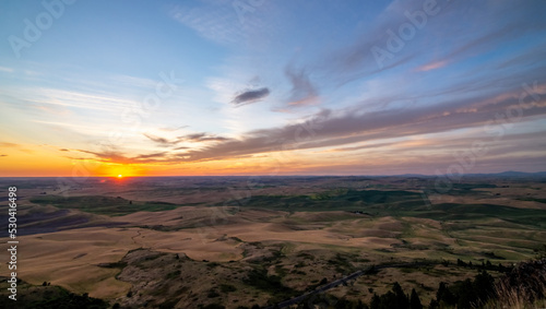 Sun setting below the horizon in a loose region of eastern Washington © digidreamgrafix
